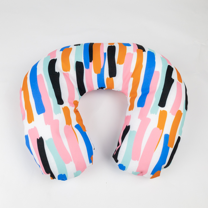 Polyester fabric travel pillow with filling flakes